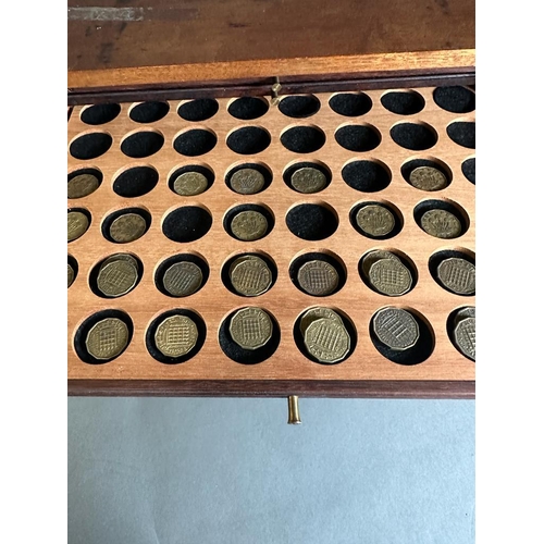 581 - A coin collectors cabinet containing a large selection of Great British coins along with worldwide c... 