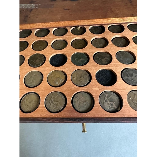 581 - A coin collectors cabinet containing a large selection of Great British coins along with worldwide c... 