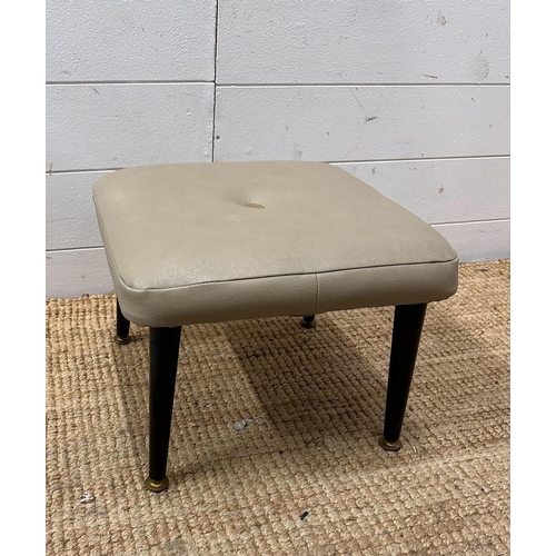 60 - A Mid Century grey upholstered button back foot stool on four black painted splayed legs (H28cm W36c... 