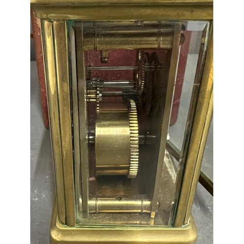 600 - Edwardian eight day brass carriage clock with key and traveling case  AF