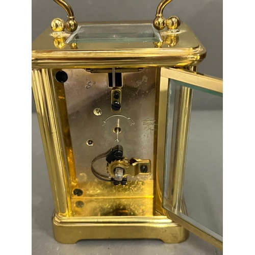 604 - Asprey brass eight day carriage clock with key