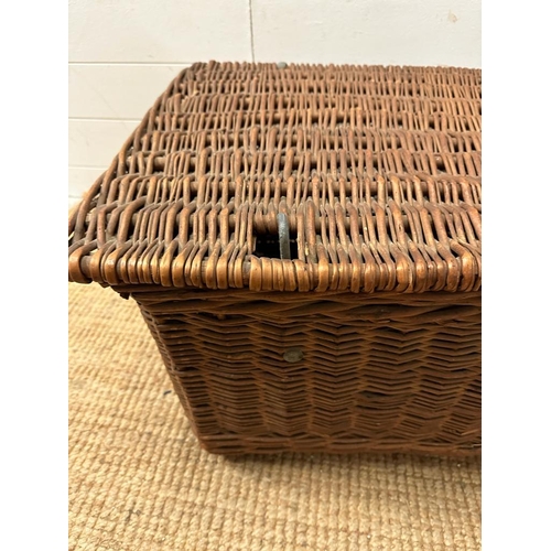 61 - A vintage wicker laundry backet