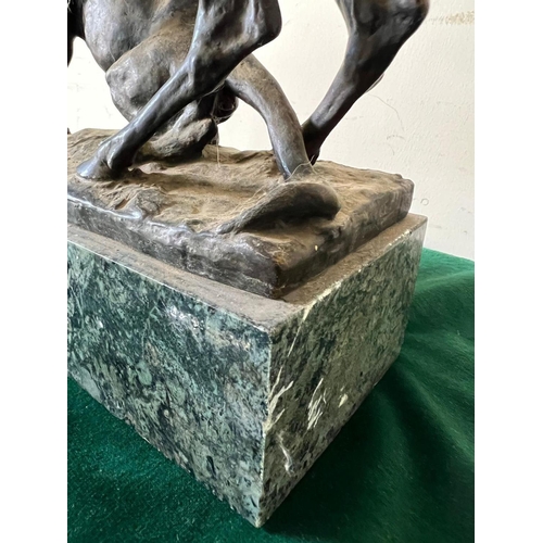 616 - A bronze sculpture of a panther seizing a stag on a marble based, signed (H32cm W30cm)