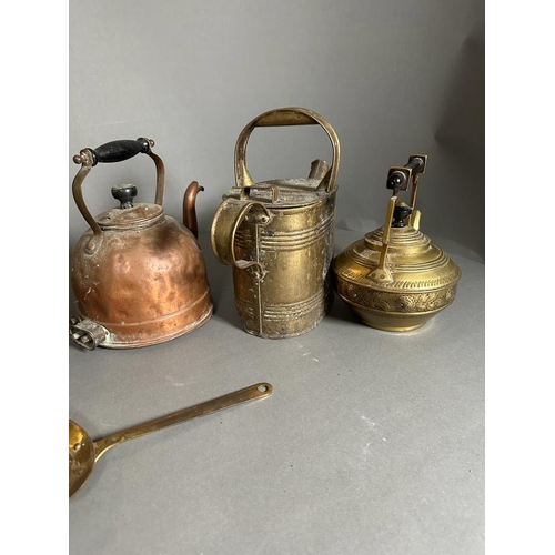 631 - A selection of brass and copper kettles