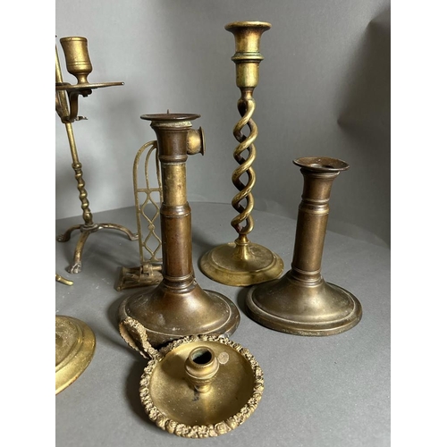 635 - A selection of brass candleholders