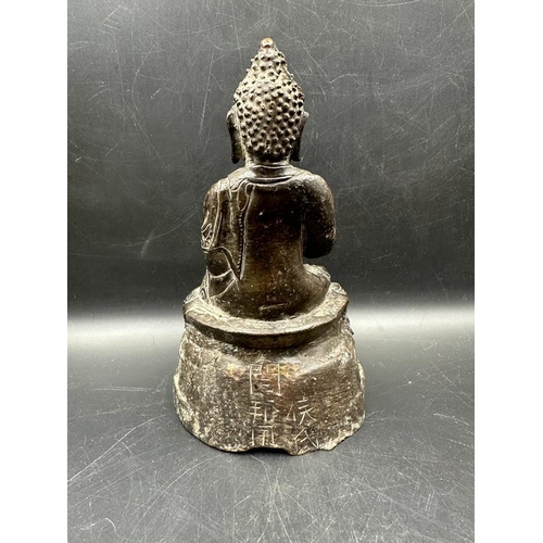 639 - A small Tibetan bronze statue