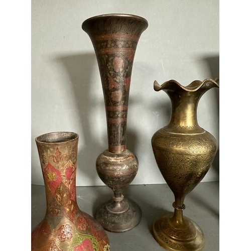 642 - A selection of seven Persian copper and brass vases