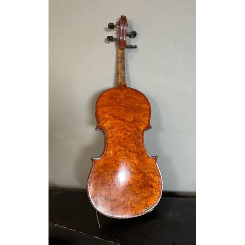 648 - A violin and bow made in Saxony, case AF bow and violin in need of new strings and hair.