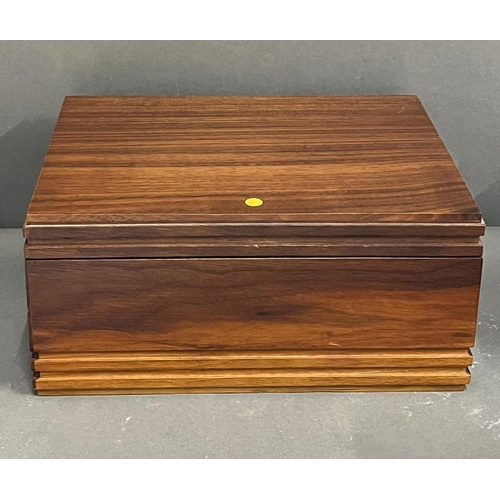 650 - A cigar humidor case along with a cutter and sixteen cigars