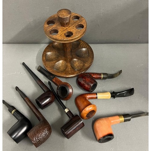 652 - Eight pipes various makers and a Dunhill oak pip stand