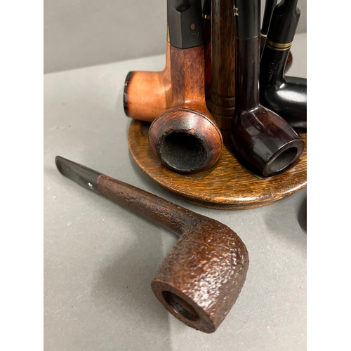 652 - Eight pipes various makers and a Dunhill oak pip stand