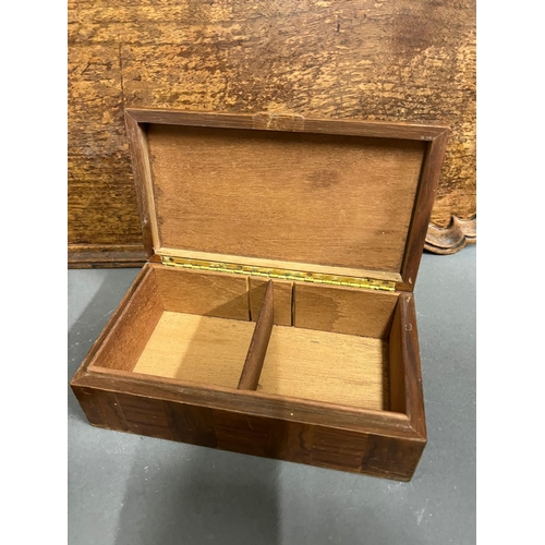 657 - A wooden tray with scrolling corners, wooden cigarette box and a tobacco lidded storage jar