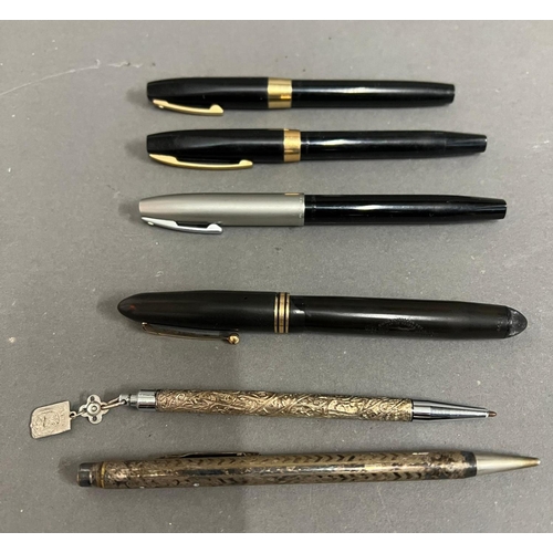 659 - Three Shaeffer fountain pens, one Swan fountain pen and two white metal propelling pencil and ball p... 