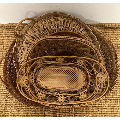 662 - A collection of six wicker baskets