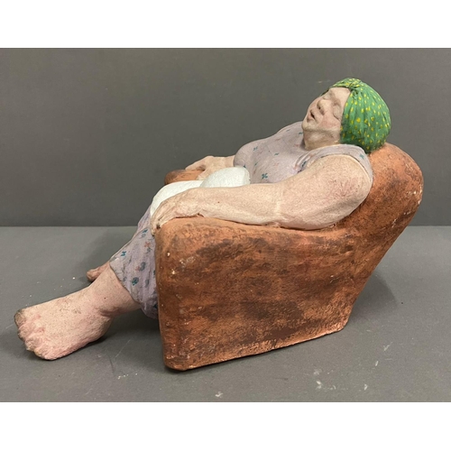 667 - A Clay sculpture of a Housewife unsigned