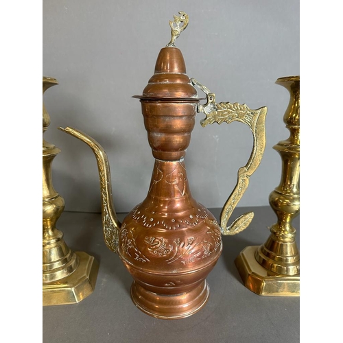 683 - Two pairs of brass candlesticks, (One set 28.5cm and 16cm tall) Along with a Persian coffee pot