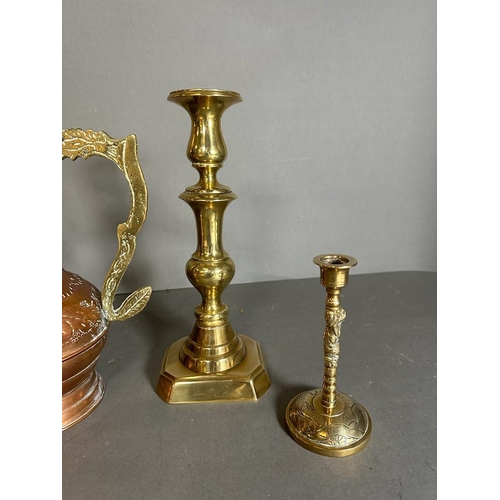 683 - Two pairs of brass candlesticks, (One set 28.5cm and 16cm tall) Along with a Persian coffee pot