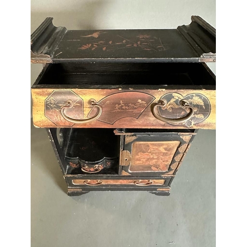 684 - A Japanned jewellery box with drawers and cupboard opening to three small drawers 44.5cm H