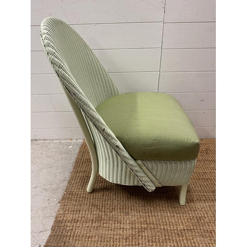 69 - A green Lloyd Loom bedroom chair