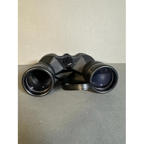 703 - A boxed pair of Soligor binoculars