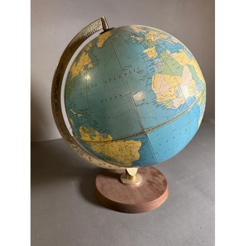 705 - A vintage globe on wooden plinth