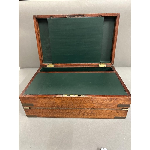 71 - A mahogany and brass writing slope with green leather interior