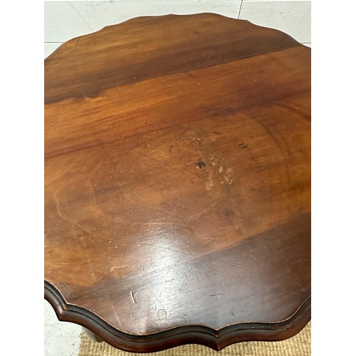 73 - A mahogany Chippendale style occasional table with shelf under AF (H76cm Dia67cm)