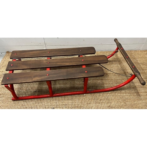 735 - A vintage metal and wooden sledge (H26cm W110cm D62cm)