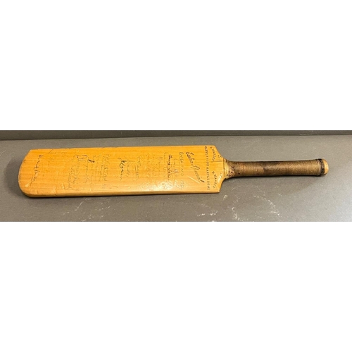 736 - A signed miniature cricket bat, England V Pakistan 1934 (46cm)