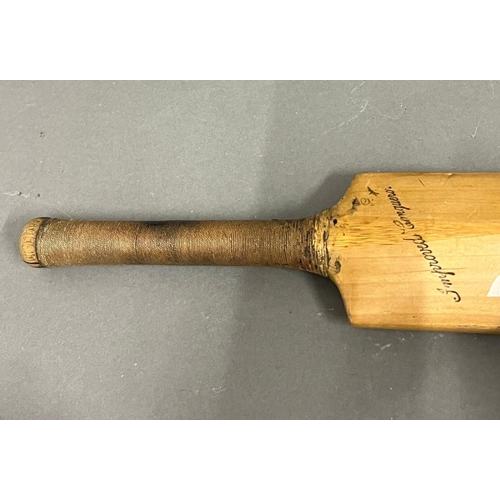 736 - A signed miniature cricket bat, England V Pakistan 1934 (46cm)