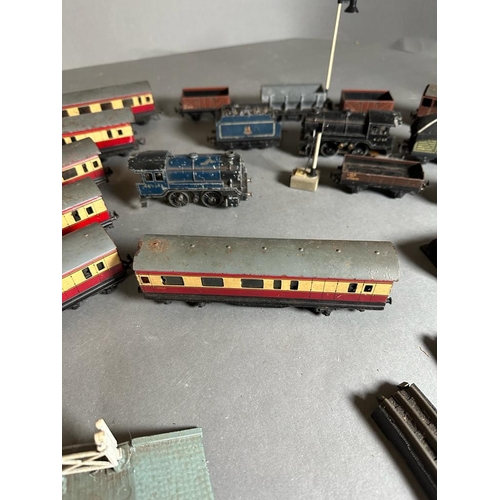 741 - A TTR Trix twin model railway comprising of two engines, eighteen carriages and in excess of fifty p... 