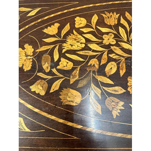 75 - A mahogany swivel top card table with floral marquetry and green baize (H74cm W84cm D43cm)