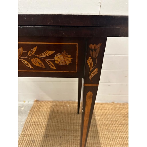 75 - A mahogany swivel top card table with floral marquetry and green baize (H74cm W84cm D43cm)