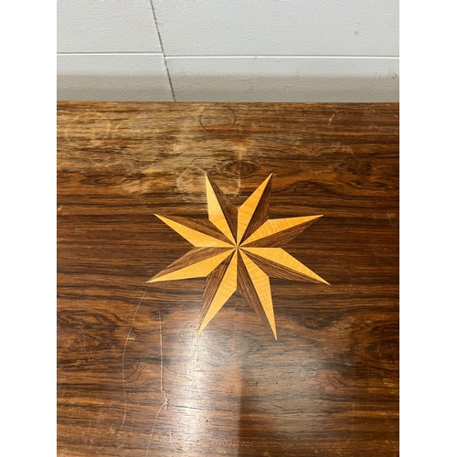 81 - A Mid Century teak coffee table with inlaid star (H46cm W124cm D48cm)