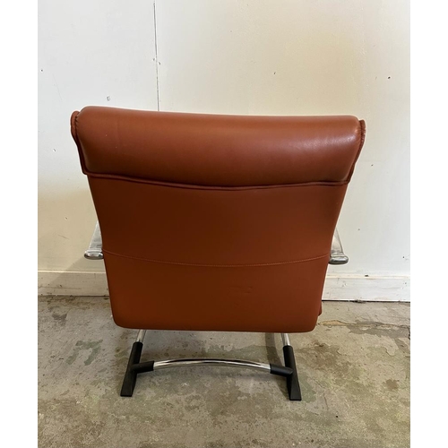 82 - A 1970's office chair by Luxy with brown upholstery on chrome legs