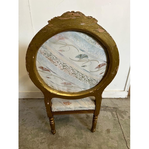 83 - Four gold painted Louis style chairs with scrolling floral upholstery