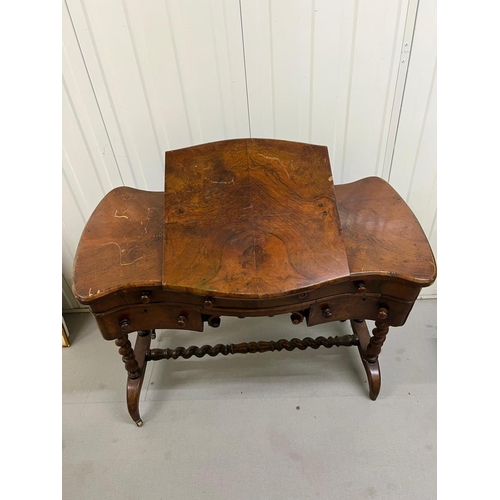 92 - A mahogany ladies writing desk on spiral supports