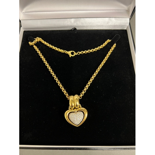 489a - An 18ct gold and pave diamond open heart shaped pendant. Rounded Belcher chain approximately 440mm l... 