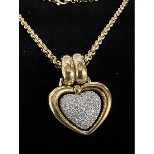 489a - An 18ct gold and pave diamond open heart shaped pendant. Rounded Belcher chain approximately 440mm l... 