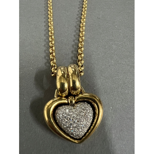 489a - An 18ct gold and pave diamond open heart shaped pendant. Rounded Belcher chain approximately 440mm l... 