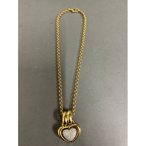 489a - An 18ct gold and pave diamond open heart shaped pendant. Rounded Belcher chain approximately 440mm l... 