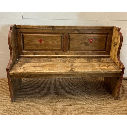 102 - A vintage pine two seater settle with painted floral detail (H90cm W140cm D42cm)