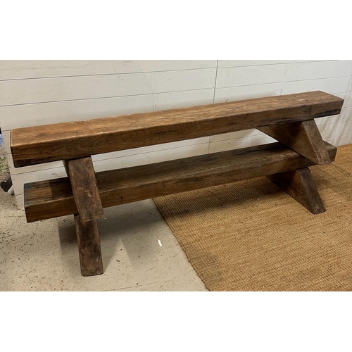 112 - Two reclaimed oak benches on triangular feet (H30cm W180cm)