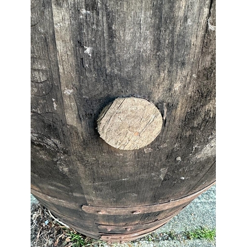 123 - Two reclaimed timber metal banded whisky barrels (H127cm Dia67cm) ( H110cm Dia 75cm)