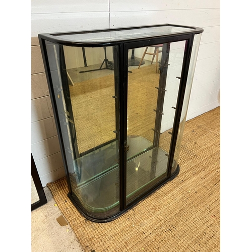 129 - A Victorian glazed shop display cabinet by George Taylor and Co H93cm W76cm D30cm