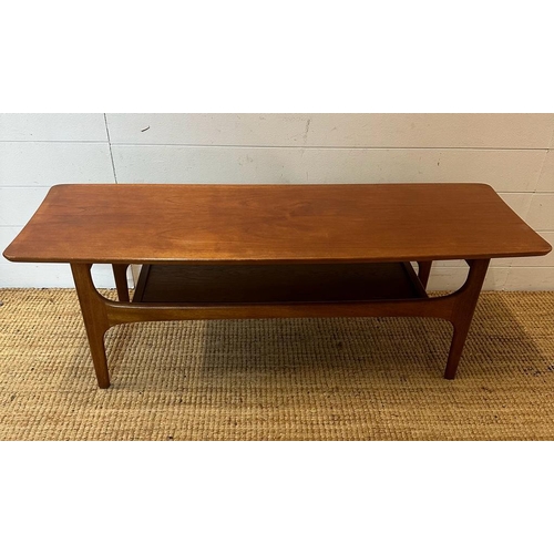 132 - A teak Mid Century coffee table with shelf under (H40cm W116cm D40cm)