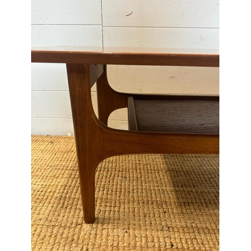 132 - A teak Mid Century coffee table with shelf under (H40cm W116cm D40cm)