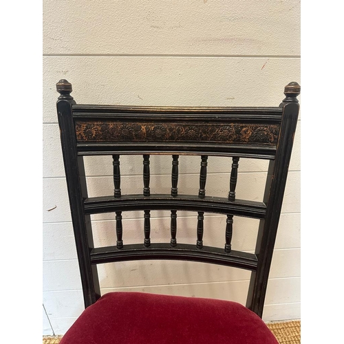 133 - A Victorian dark wood bedroom chair on castors with red upholstered seat AF