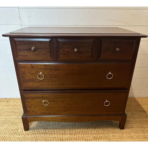 141 - A Mid Century Stag three over two dark wood chest of drawers (H70cm W82cm D46cm)