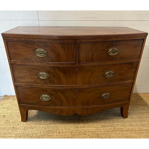 142 - A George III style two over two bow fronted chest of drawers (H82cm W105cm D50cm)